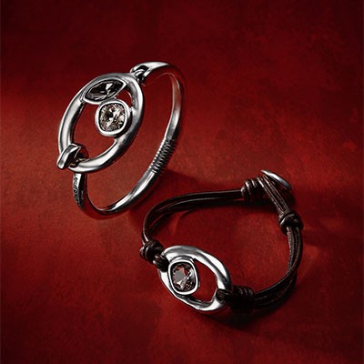 2 silver and leather UNOde50 bangles