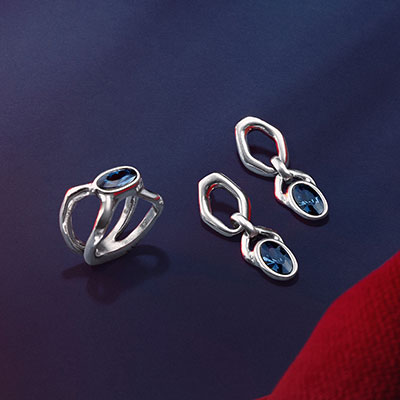 Silver ring and earrings with blue gemstone by UNOde50