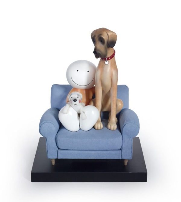 Always be by your side by Doug Hyde. Sculpture of a Figure sat in a chair with 2 dogs