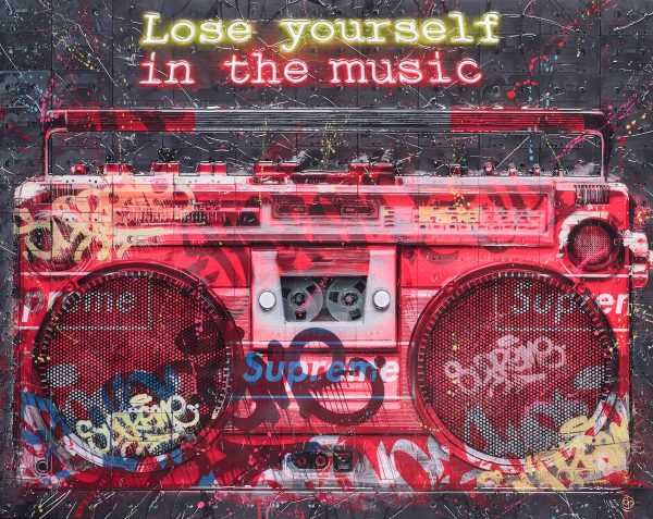 Lose yourself in the music by Dan Pearce. Artwork showing a cassette stereo, painted on top of cassete tape background, with graffiti style wring over the top.