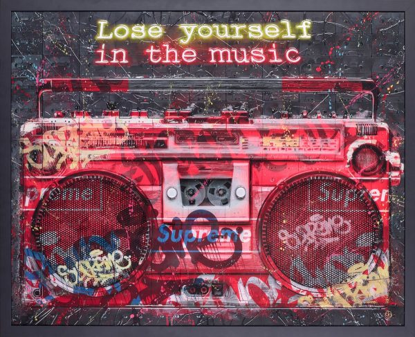 Lose yourself in the music by Dan Pearce. Artwork showing a cassette stereo, painted on top of cassete tape background, with graffiti style wring over the top. In a black frame