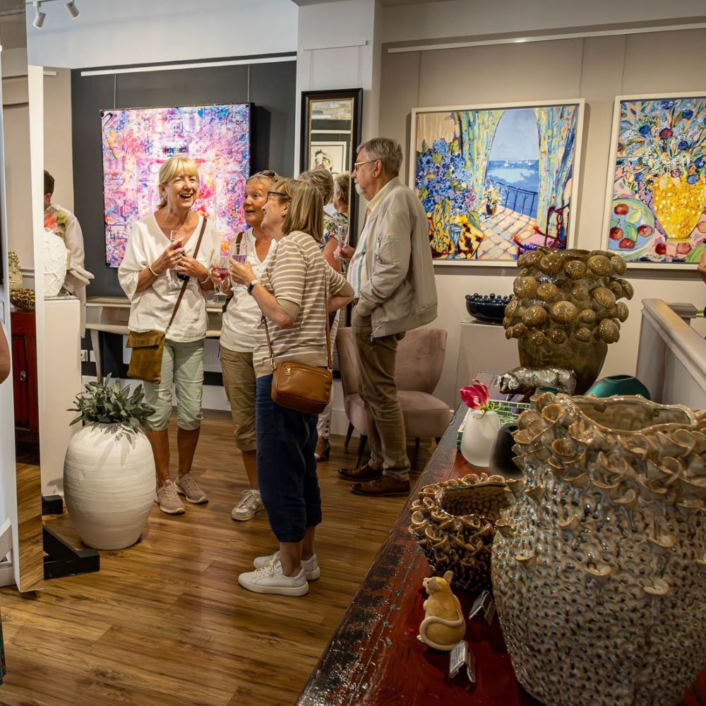 People in the gallery enjoying the pop of colour exhibition